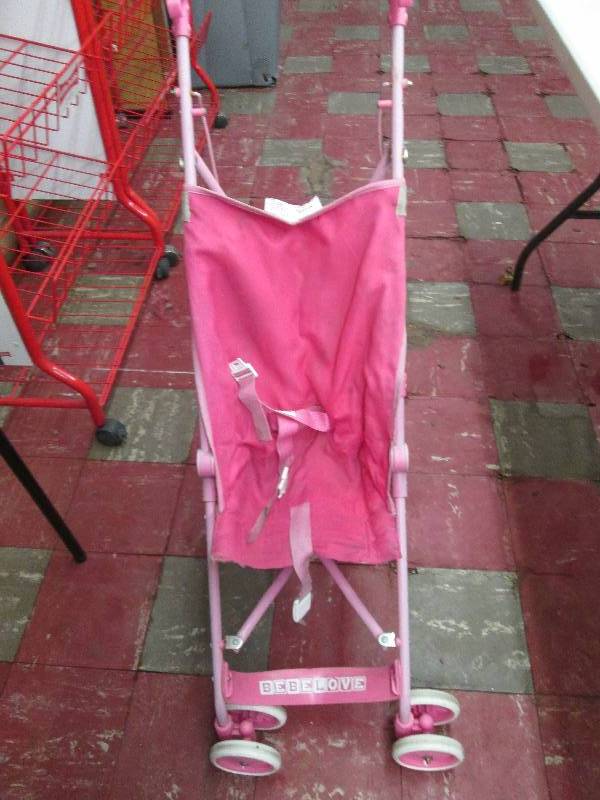 lot 157 image: Pink Umbrella Stroller...