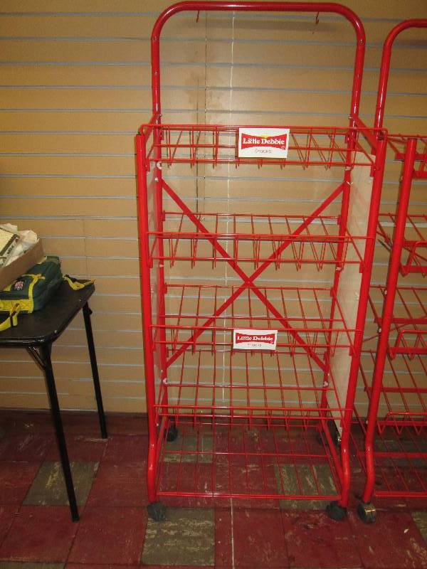 lot 208 image: Red Metal Display Rack...