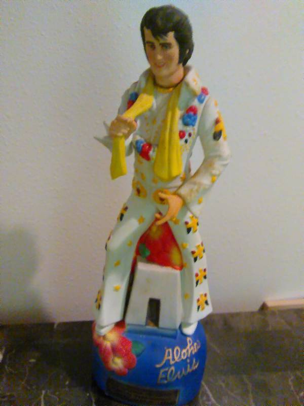 lot 31 image: Vintage Aloha Elvis Decanter, cork needs come repair, see pictures for full details.