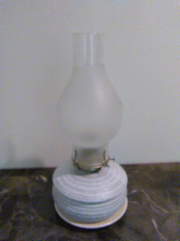 lot 83 image: Vintage Crock Pottery Oil lamp with Frosted Globe, 14 inches tall, neutral tone in color