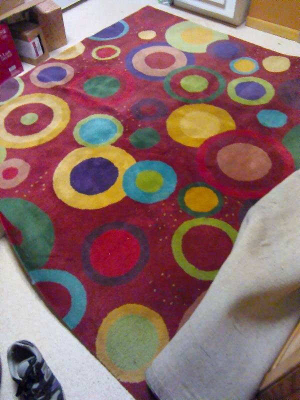 lot 105 image: Area Rug, Red, World Rug Traders 7 ft. x 10 ft.