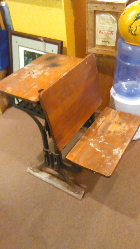 lot 132 image: Antique School Desk Circa 1880, Wood is fabulous, finish needs some attention. Cast iron base
