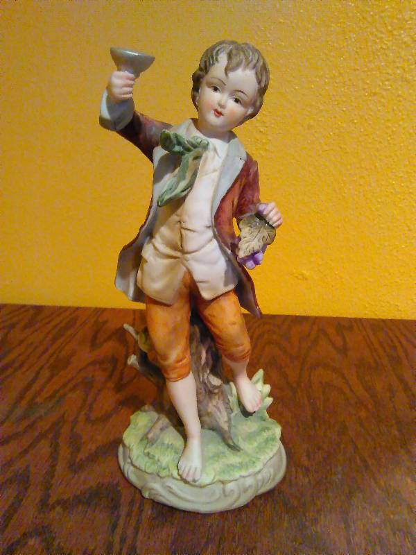 lot 198 image: Vintage Andrea by Sadek 7161 Boy Figurine Grapes
