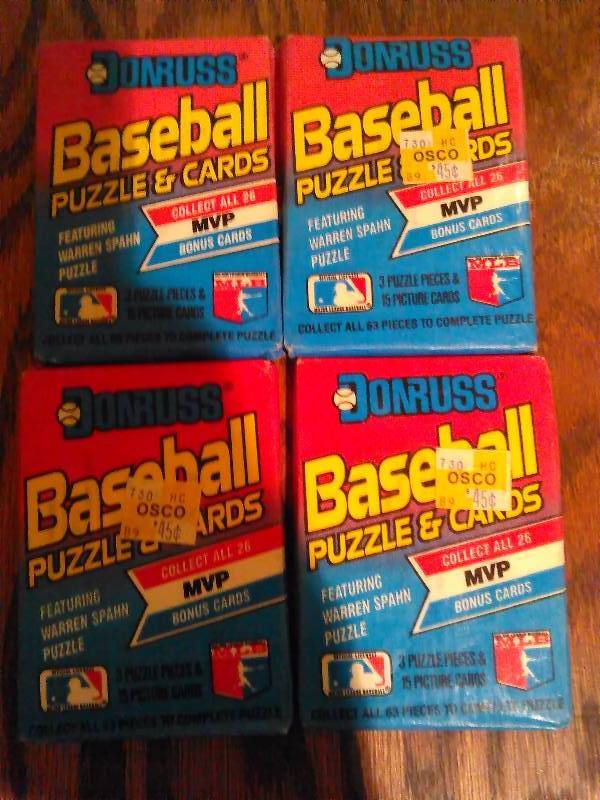 lot 275 image: 4 pack, Donruss Baseball Puzzle and Cards, New Wax Packs, 72 cards total.