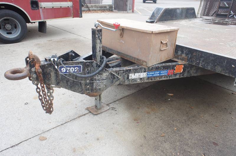 1999 FELLING TRAILER - 19 LONG X 8 WIDE - 12000LB - TOOL BOX ATTACHED - STEEL BED - (# 9702)