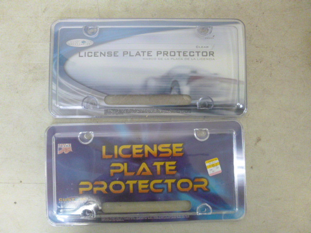 lot 121 image: 2 Clear License Plate Frames