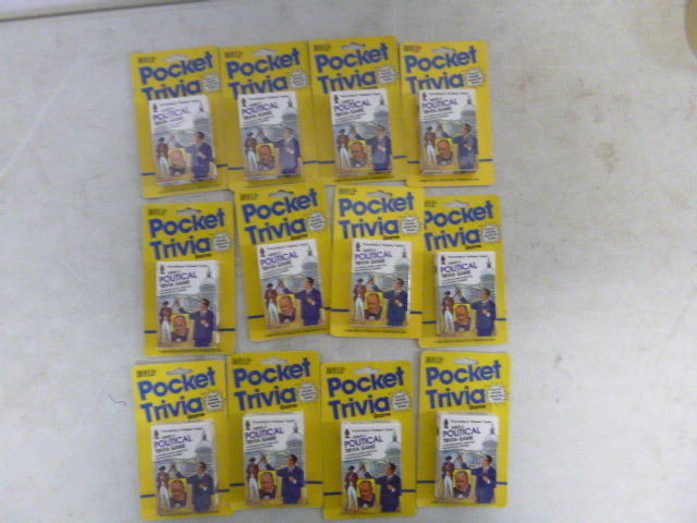 lot 444 image: 12 Hoyle Pocket Trivia Game