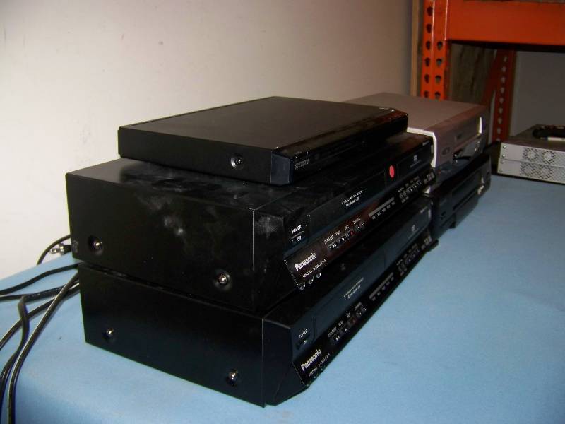lot 66 image: (1) Sony, DVD Player, (2) Panasonic DVD  VCR Combos and (2) VCRs