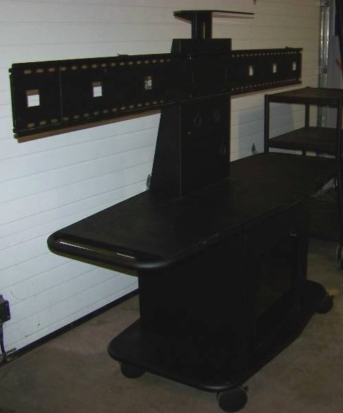 lot 80 image: Large, Rolling, TV  Television, AV Cart with Rack Space and Smoked Glass Front Door