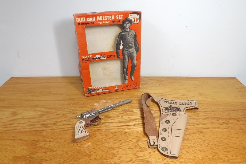 lot 1 image: 1930s Esquire Tales of Wells Fargo Gun and Holster Set in Original Box