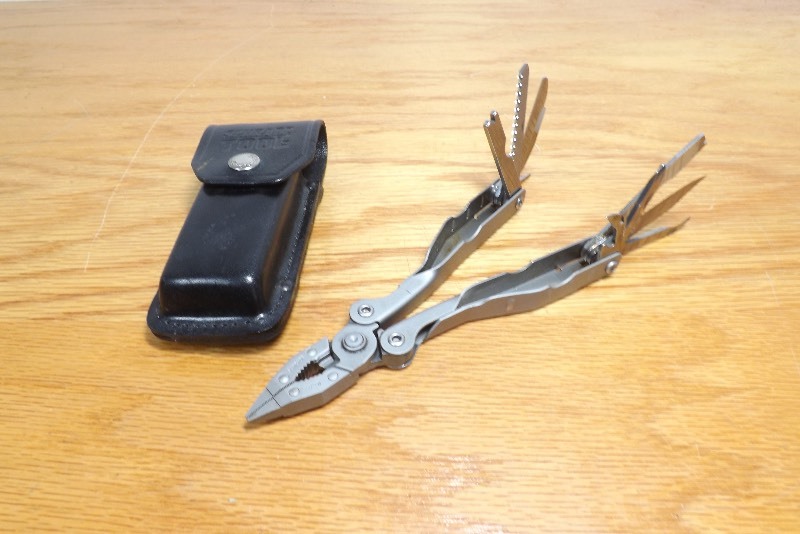 lot 13 image: Vintage MINT Schrade Tough Multi-Tool with Leather Case