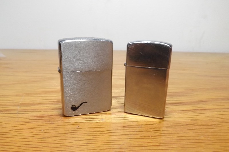 lot 19 image: 2 Vintage Zippo Lighters