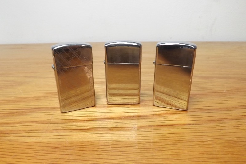 lot 20 image: 3 Vintage Zippo Lighters
