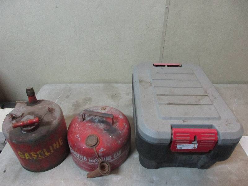 2 metal gas cans and Rubbermaid tool box