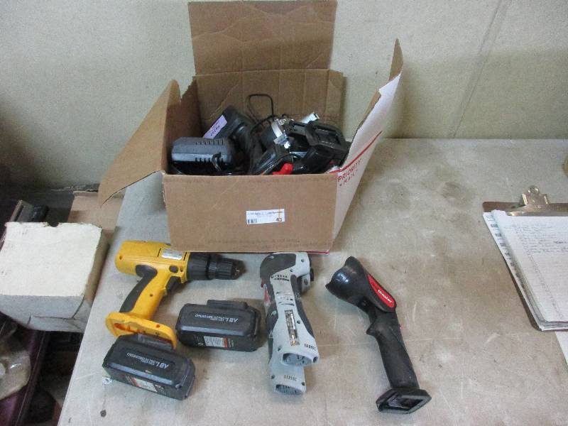assorted batteries, drills and lights