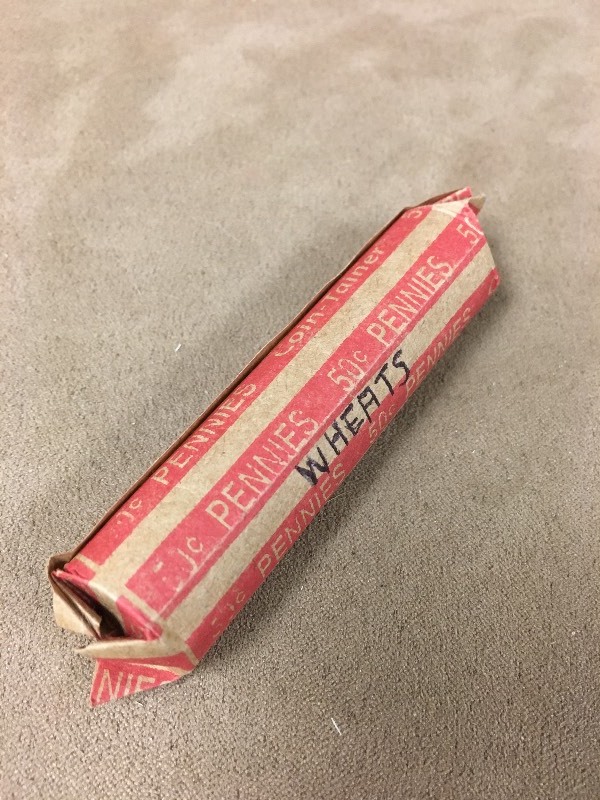 1 roll of mixed date Wheat cents...