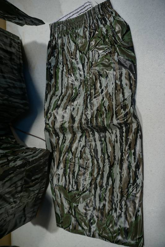 lot 193 image: Real Tree Camo Design 2 Piece JacketPants Vinyl Rain Suite
