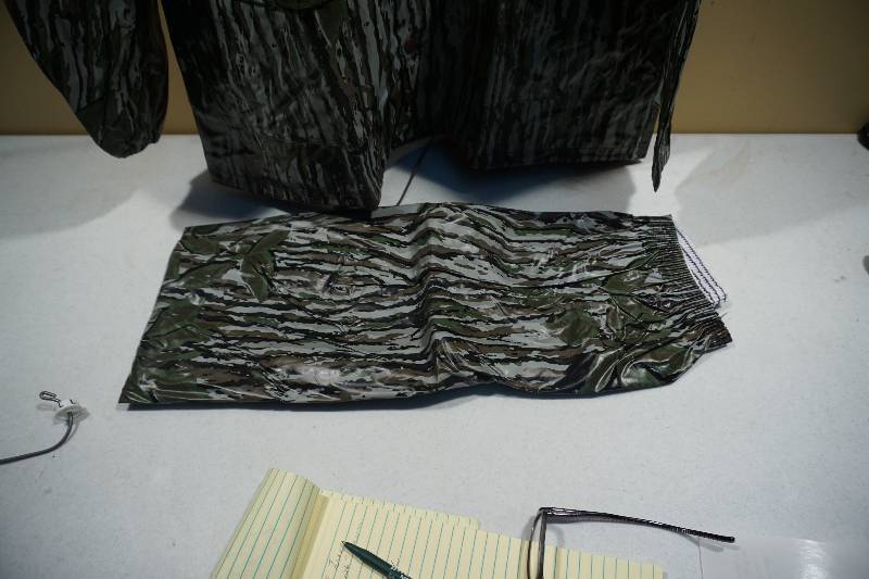 lot 194 image: Real Tree Camo Design 2 Piece JacketPants Vinyl Rain Suite
