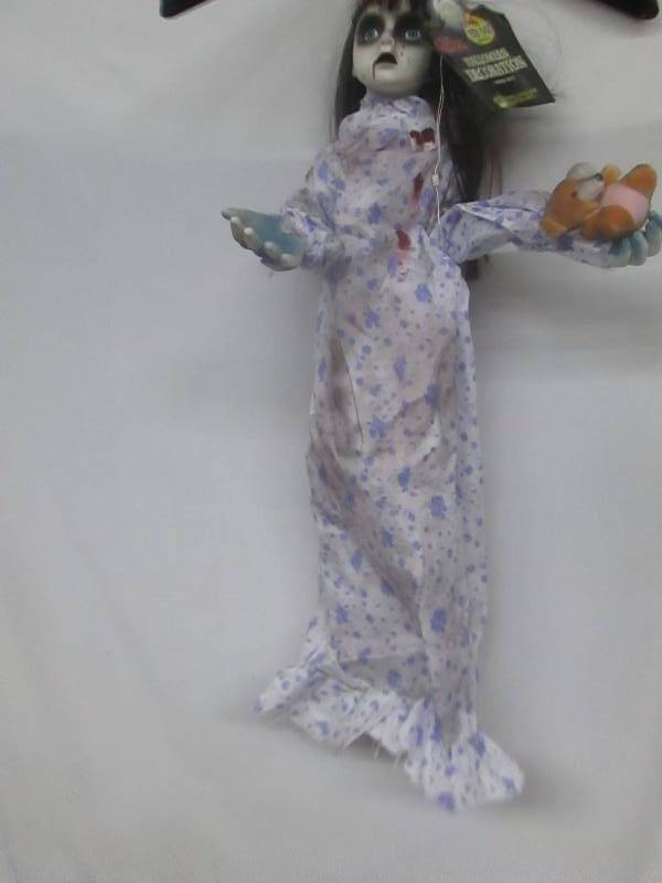 lot 97 image: Animated Hanging Doll