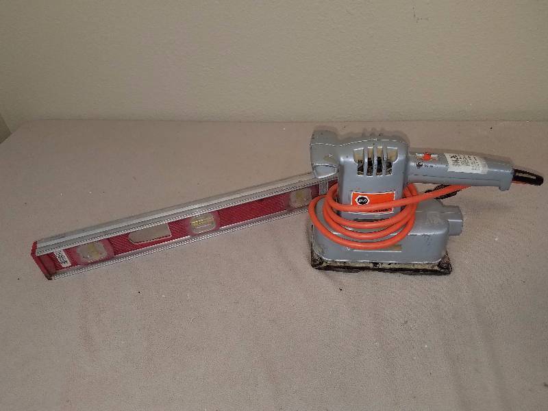 lot 86 image: Ace Level and Black and Decker Sander