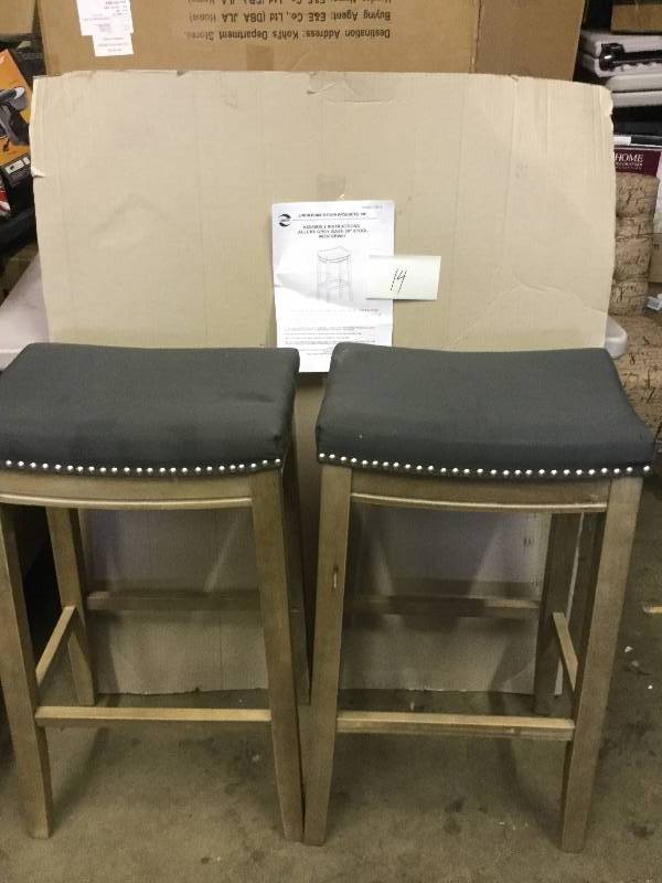 lot 14 image: Lot of 2 Allure Grey Wash 30 stools- one of them has a missing side bottom