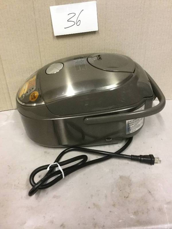 lot 36 image: Zojirushi induction heating preassure rice cooker and warmer