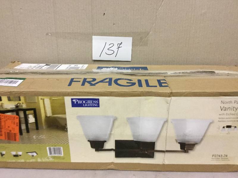 lot 137 image: Progress Lightning North Park Collection Vanity with Etched Glass