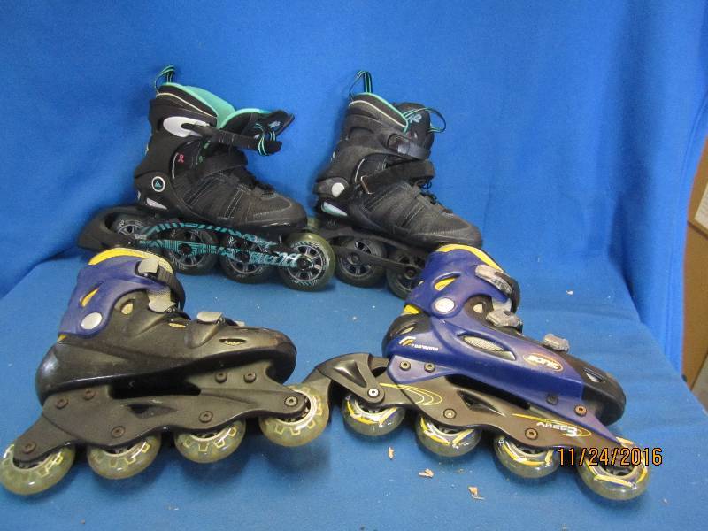 2 pairs of roller blades, size 5 an...