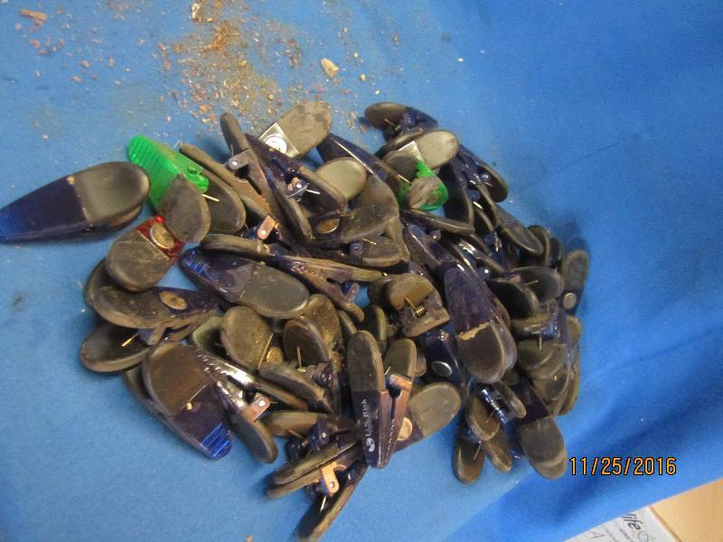Lot of magnetic back plastic clips...