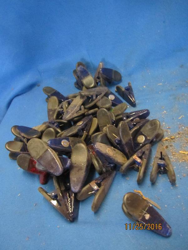 Lot of magnetic back plastic clips...