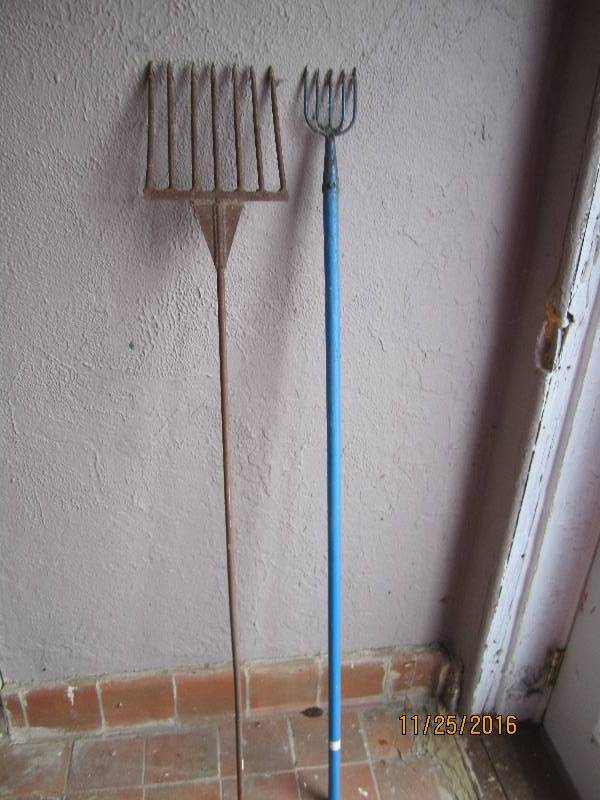 2 fishing spears...