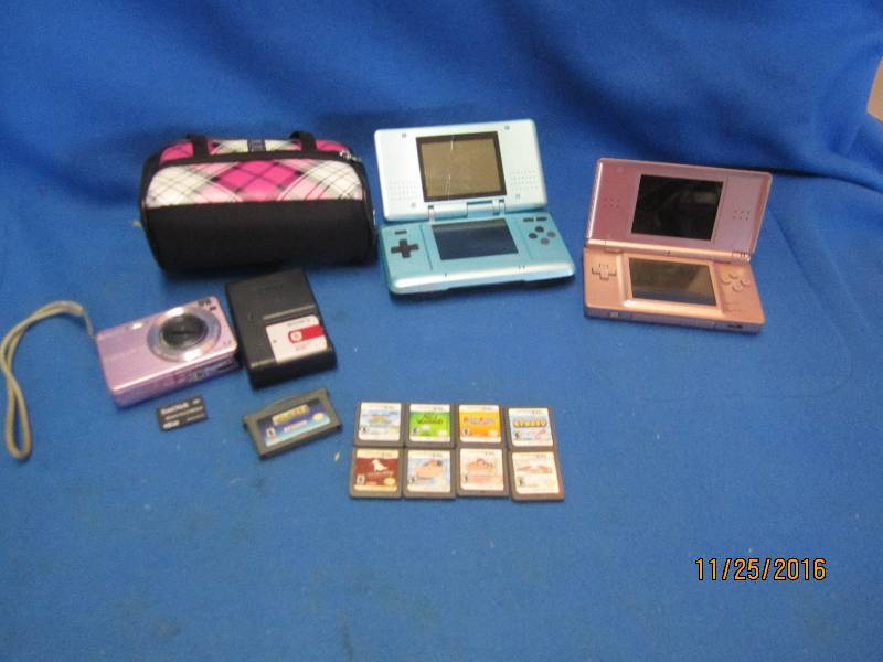 2 Nintendo DS and DS Lite with game...