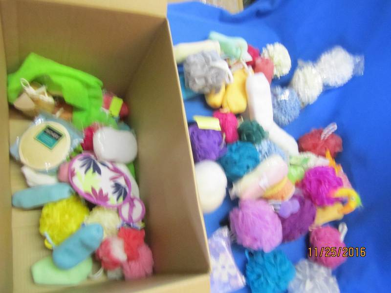 Large box of new high end bath scru...