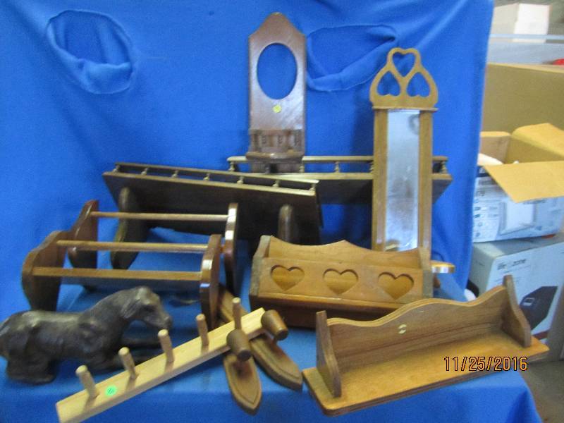 Lot of wooden shelf wall displays...