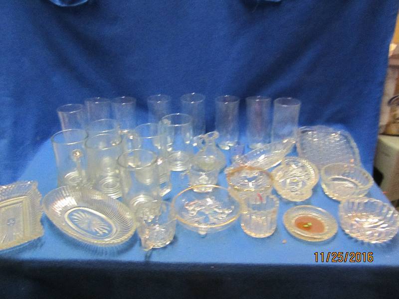 Lot of drinking glasses, mugs, and ...