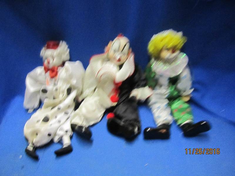 3 porcelain clowns...