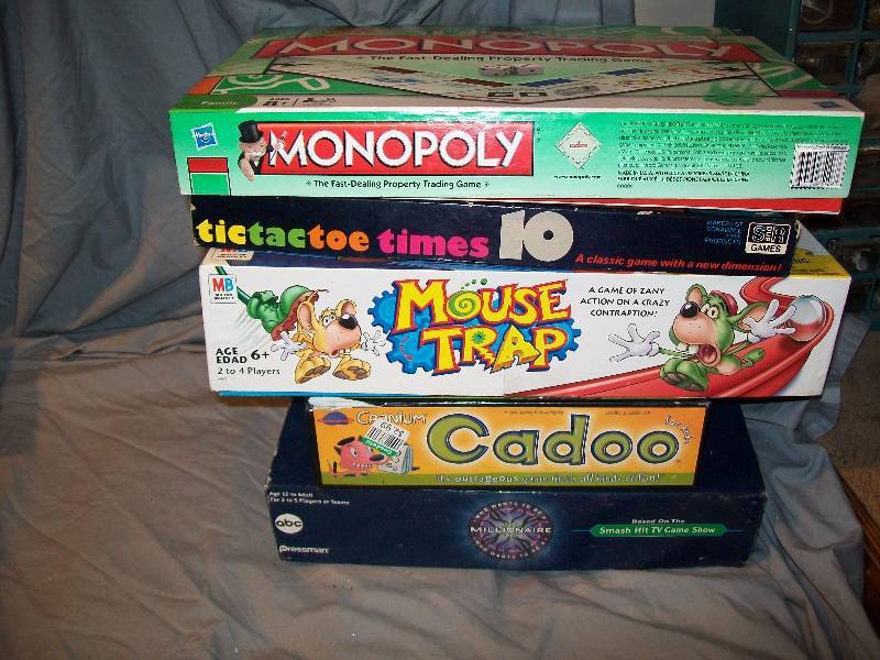 lot 31 image: 5- Vintage KidsAdults Family Board Games Includes Monopoly Mouse Trap Cadoo Who Wants Millionaire