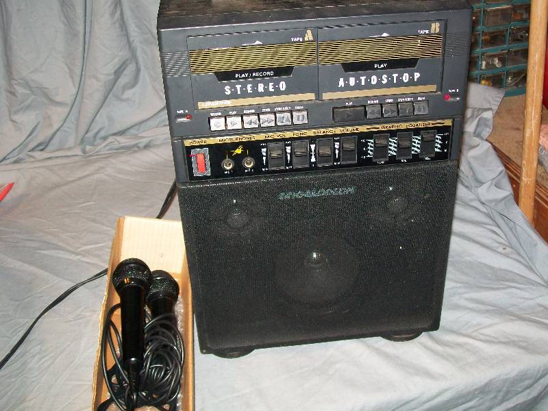 lot 33 image: ACDC Singalodeon Karaoke Machine with RightLeft Output & two Microphones.