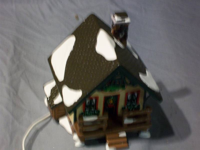 lot 40 image: 1994 Vintage Department 56 Original Fishermans Nook Bass Cabin.