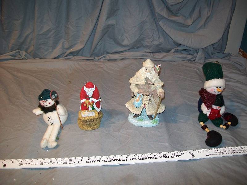 lot 49 image: Lot of 4 Decorations Reindeer Father ChristmasSanta Claus, Pipka Santa with Christ Child, & 2 Snowman