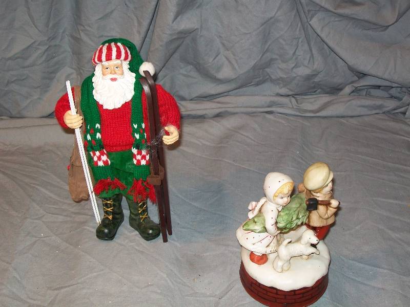 lot 48 image: See Video. 10 Tall Skiing Father ChristmasSanta Claus & Music Box kidsTreeDog PlaysOChristmas Tree