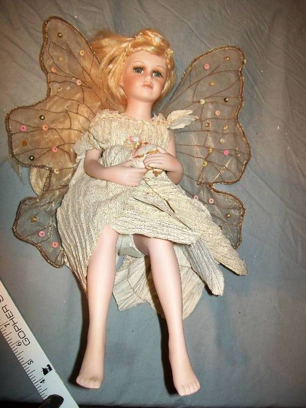 lot 63 image: 16 Finely Detailed Fairy Doll with Porcelain Face & Exquisite Clothing with Wings.