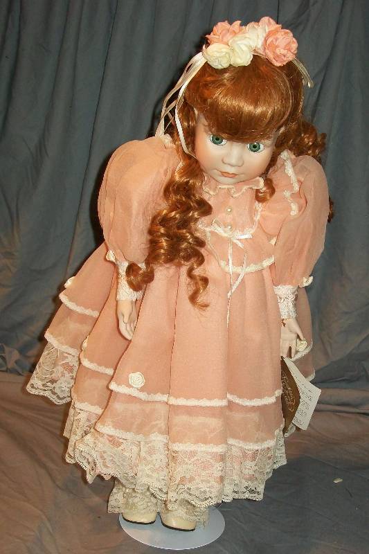 lot 66 image: 21 on Stand. Franklin Heirloom Doll, Finely Detailed Bisque Porcelain Head & Victorian Era Clothing