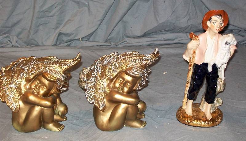 lot 75 image: 12 Shepherd carrying lamb and 2- 8 Plastic Cherubs painted Golden. (See Shepherd in Lot 55)