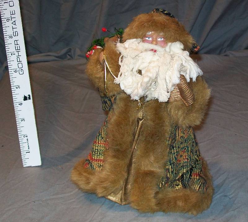 lot 93 image: 11 Father ChristmasSanta Claus Tree Topper Dressed like a French Quarter Santa