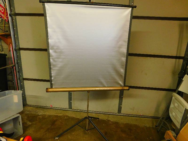 lot 64 image: Vintage Radiant 39 by 39 SlideMovie Projector Screen wTripod