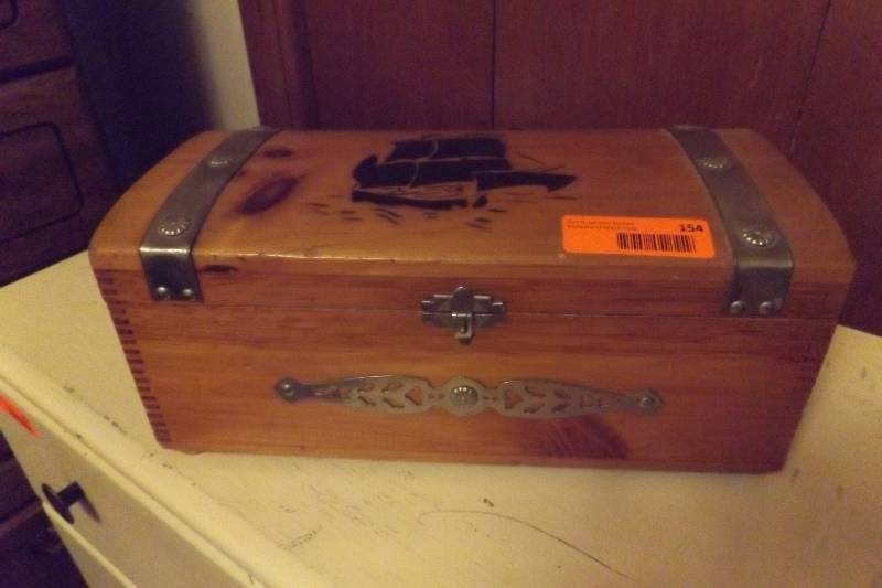 lot 154 image: Wood box with burnt ship dcor, metal straps, handles