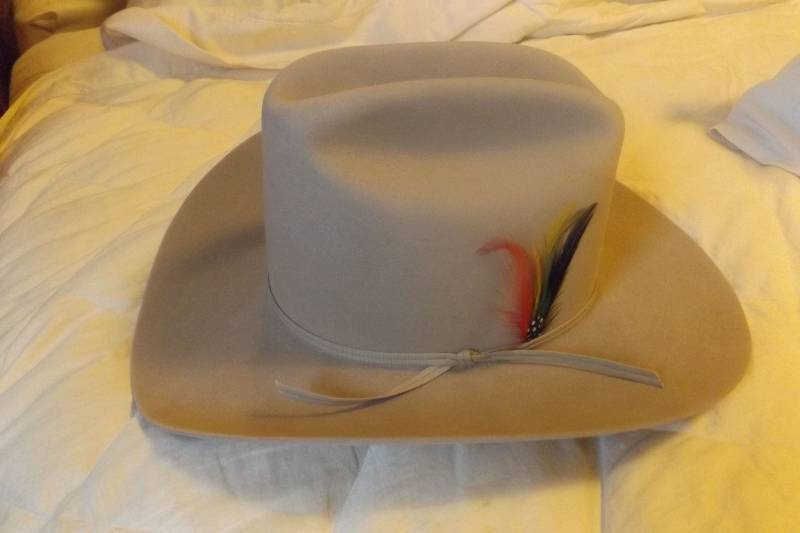 lot 184 image: Stetson hat, thin band and feathers