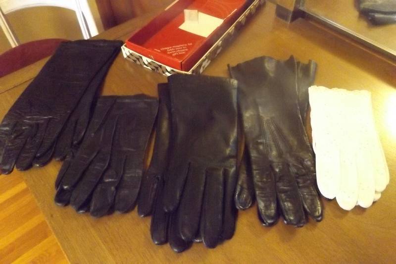 lot 192 image: Four pairs of black leather gloves, various lengths and styles, one pair white gloves, all are size small