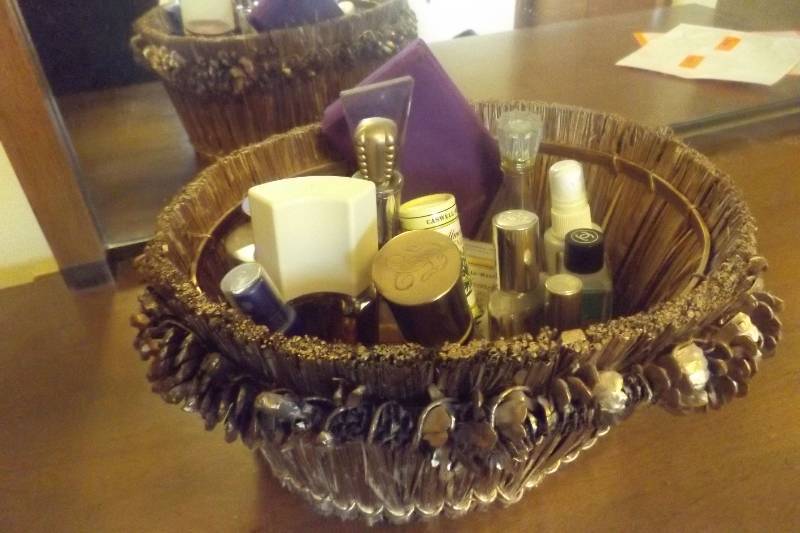 lot 201 image: Basket of perfume including Shalimar and Emeraude, and perfume bottles